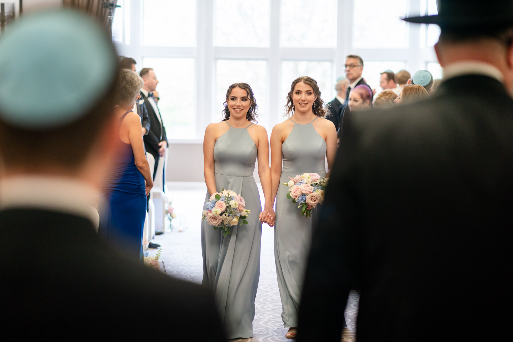 jewish bridesmaids arrive at Chuppah