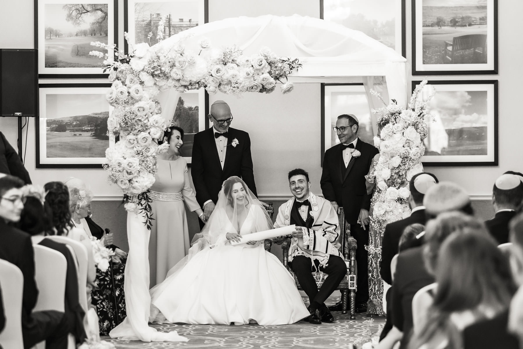 jewish wedding groom and bride under Chuppah