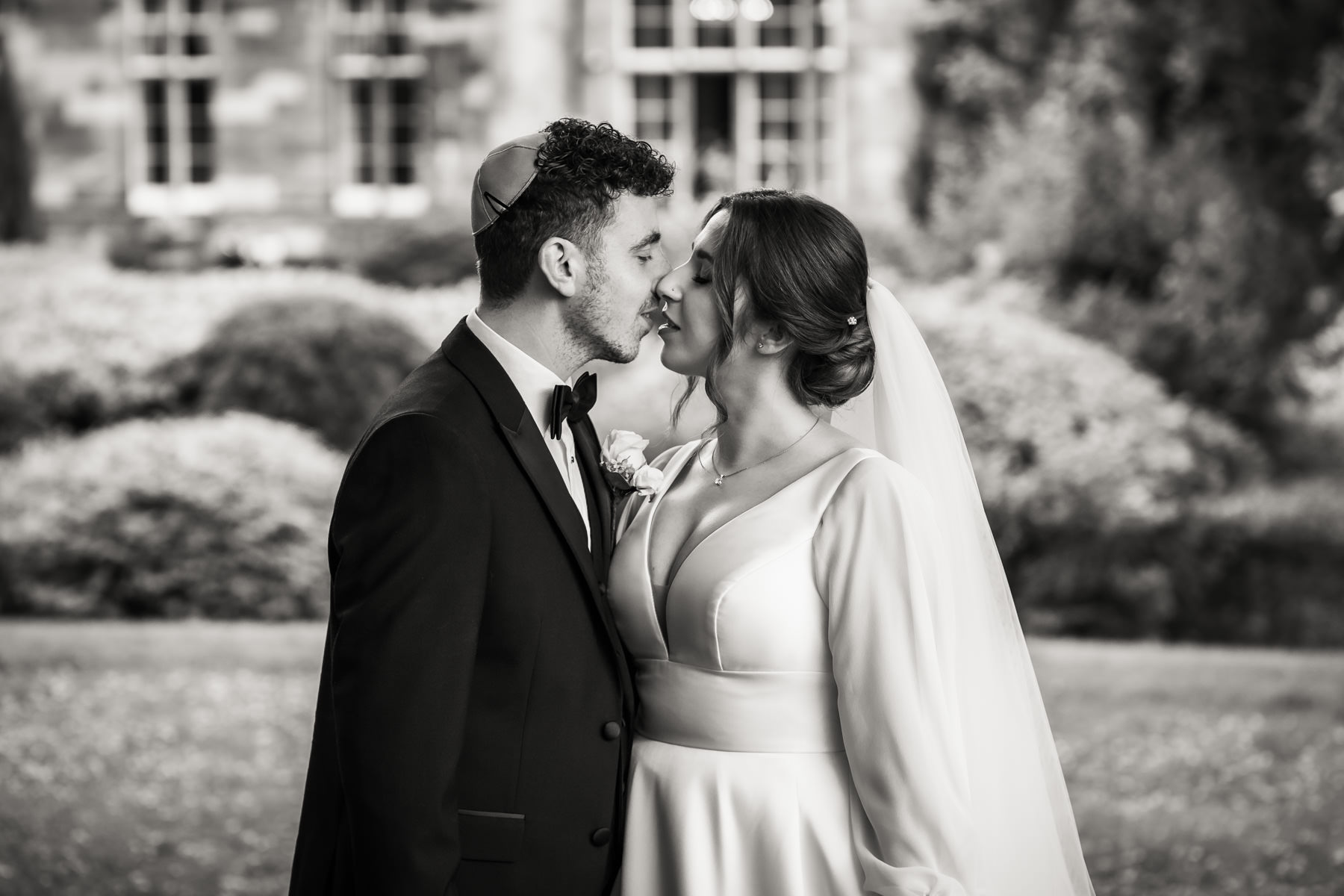 Jewish wedding at Mar Hall bride and groom kiss