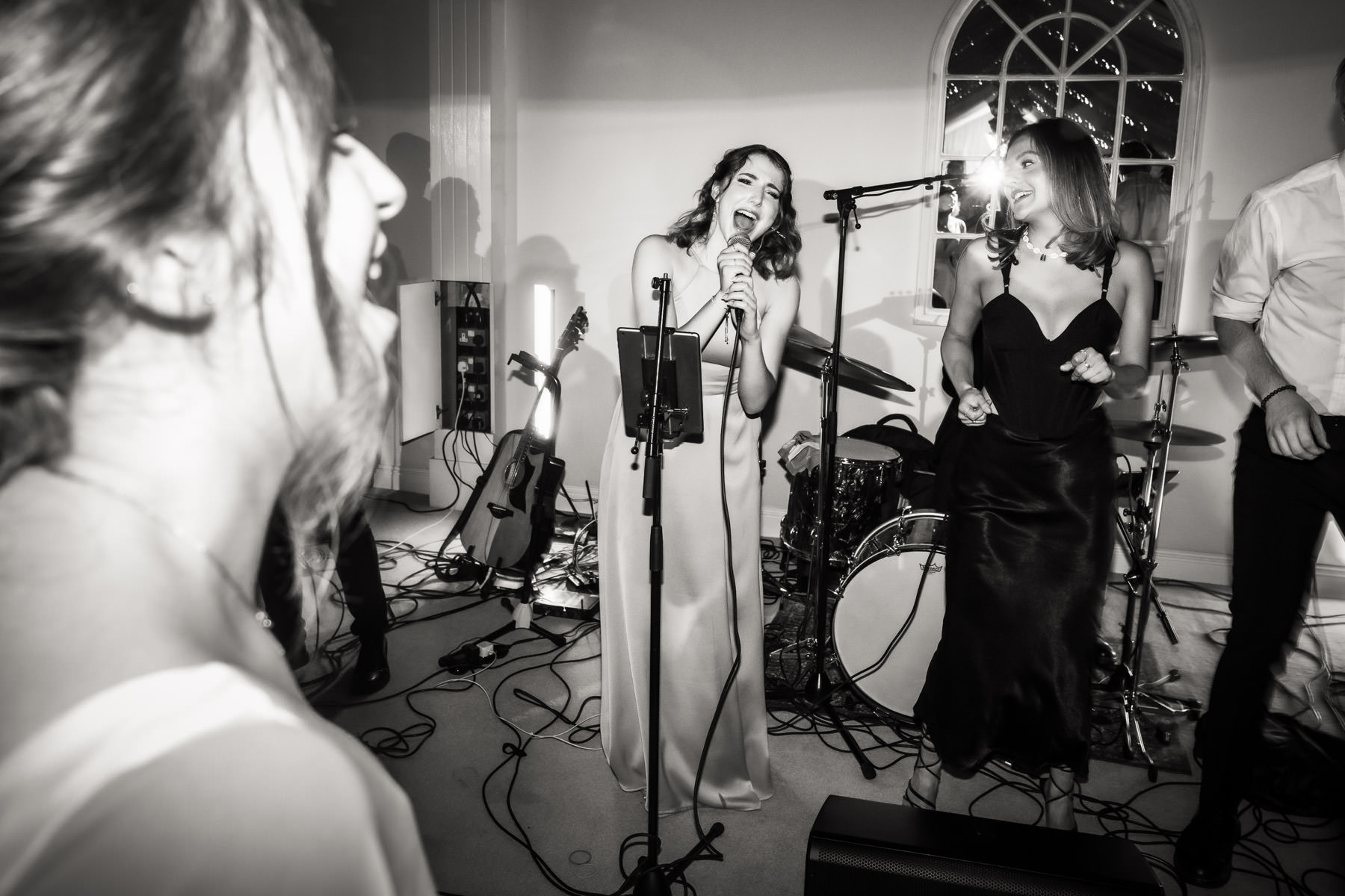 Jewish wedding guests on stage