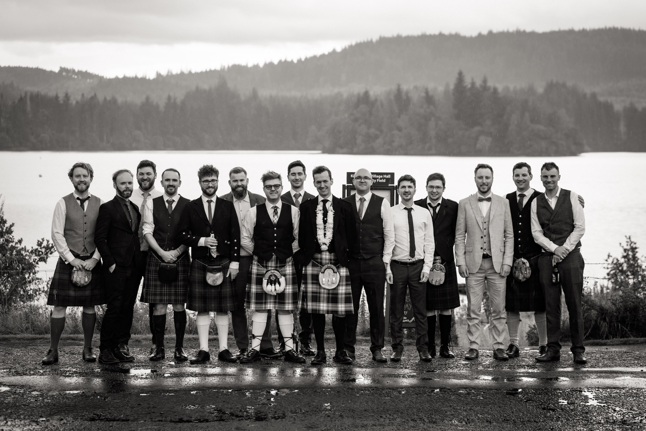 Kinlochard wedding group in the rain